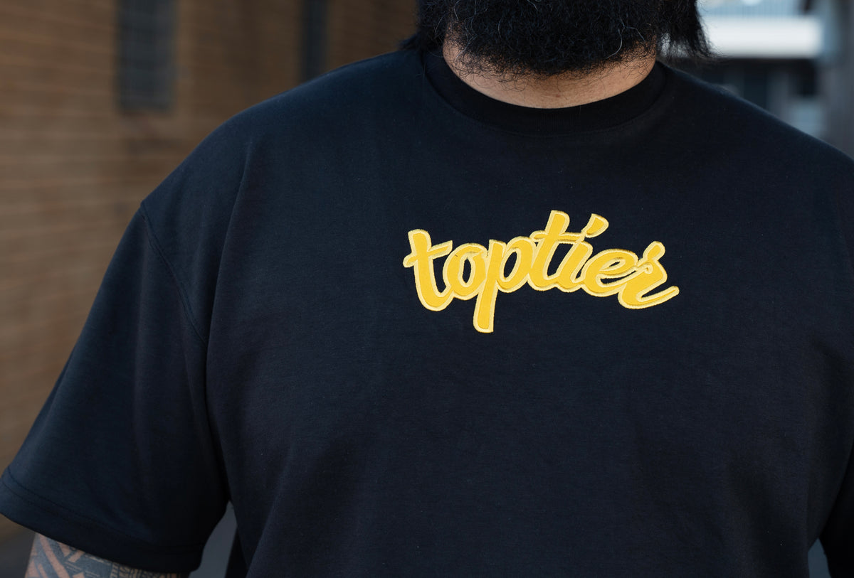 BLACK SHIRT W/ WHITE & GOLD PRINT